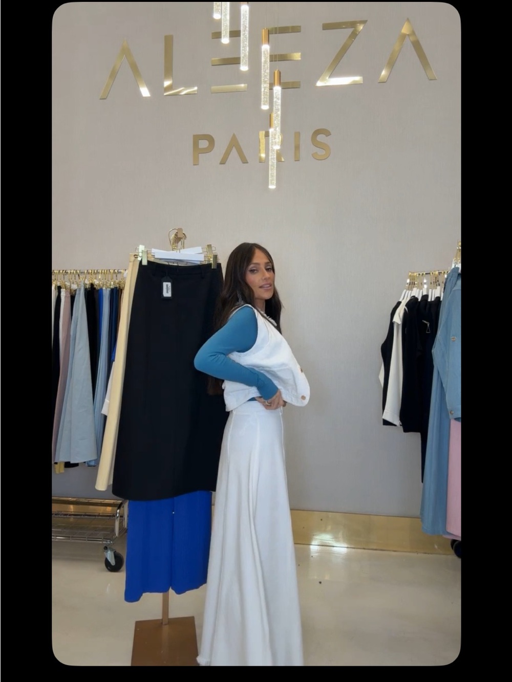 Aleeza Paris White Denim Maxi Skirt with frayed hem.